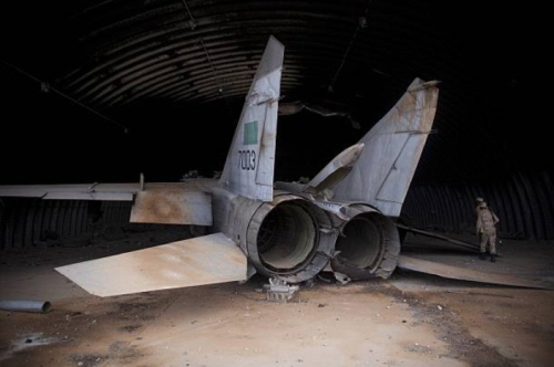 Libyan MiG-25PD Foxbat-E under hardened shelter at Ghardabiya airbase after B-2 attack 01