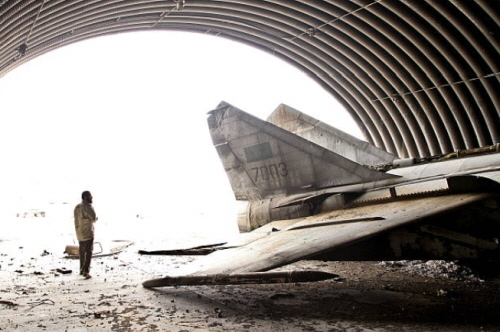 Libyan MiG-25PD Foxbat-E under hardened shelter at Ghardabiya airbase after B-2 attack 02