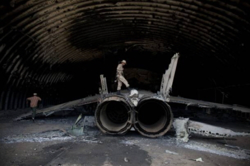 Libyan MiG-25PD Foxbat-E under hardened shelter at Ghardabiya airbase after B-2 attack 04