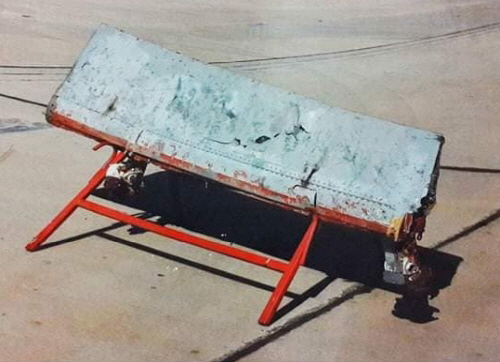 According to Libyan media, presumably part of the wreckage of the American F-14 aircraft that was shot down in the aerial engagement. It bears the aircraft's name and part number and is located at the headquarters of  1022nd Squadron at Ghardabiya (Sirte) Air Base.