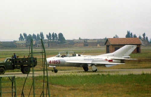 Chinese 44th Air Division’s two seater training aircraft Shenyang JJ-6 Farmer in 1979 at the Kunming airport. Photo: Robert Setterfield.