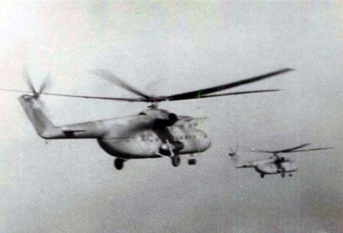 Soviet 688th Independent Helicopter Regiment’s Mi-6 Hook heavy cargo helicopters in the sky. Each squadron used an average of 10 large transport helicopter.
