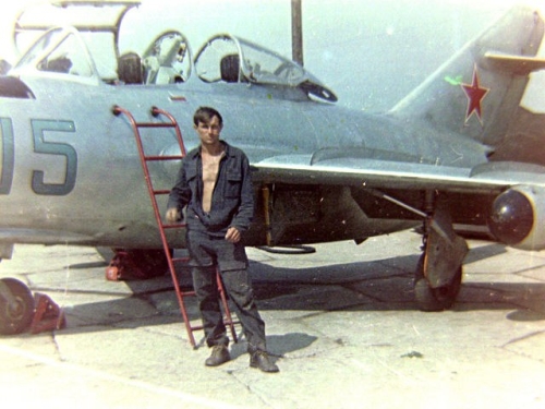 The 69th independent Training Air Regiments soldier in front of MiG-15UTI Midget