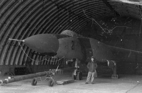 USSR 82nd Fighter Air Regiment’s MiG-25PDS ‘Foxbat-E’ under a hardened aircraft shelter in the eighties