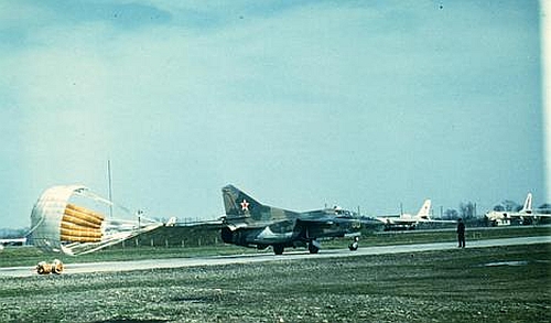 The 179th Fighter Bomber Air Regiment’s MiG-23UB Flogger-C type is rolling in front of the 260th Long Bomber Regiment's bomber Tu-16s at Striy airport.